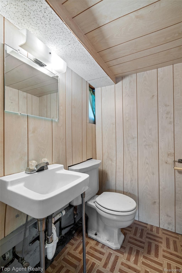 23123 E 13 Mile Rd, Saint Clair Shores, MI 48082 - half bathroom featuring wood walls and wooden ceiling