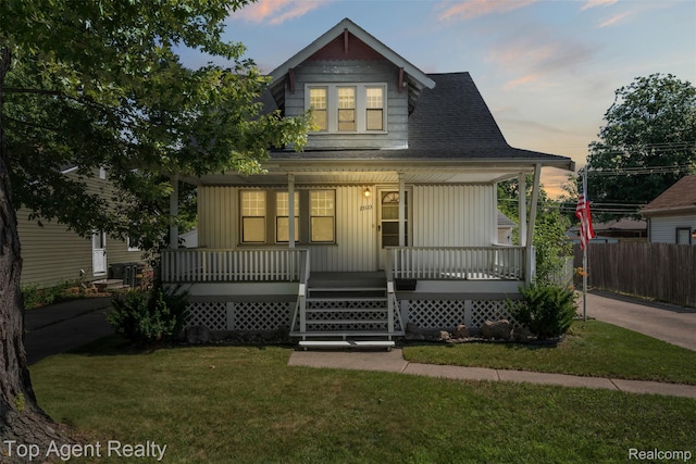 23123 E 13 Mile Rd, Saint Clair Shores, MI 48082 - bungalow-style home featuring a porch and roof with shingles