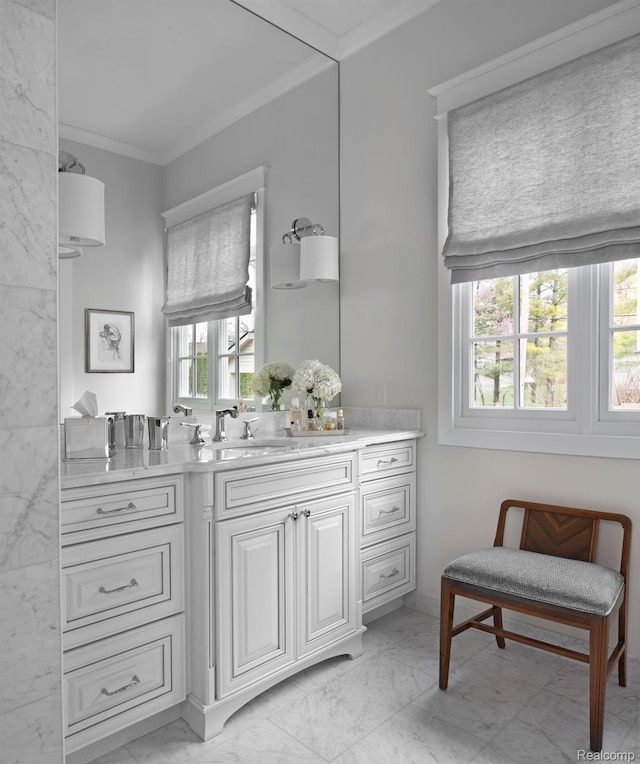 160 Darling Dr, Lake Orion, MI 48362 - bathroom featuring marble finish flooring, vanity, healthy amount of natural light, and ornamental molding