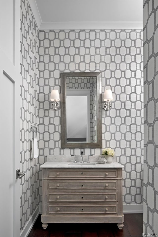 160 Darling Dr, Lake Orion, MI 48362 - bathroom featuring vanity, wallpapered walls, and crown molding