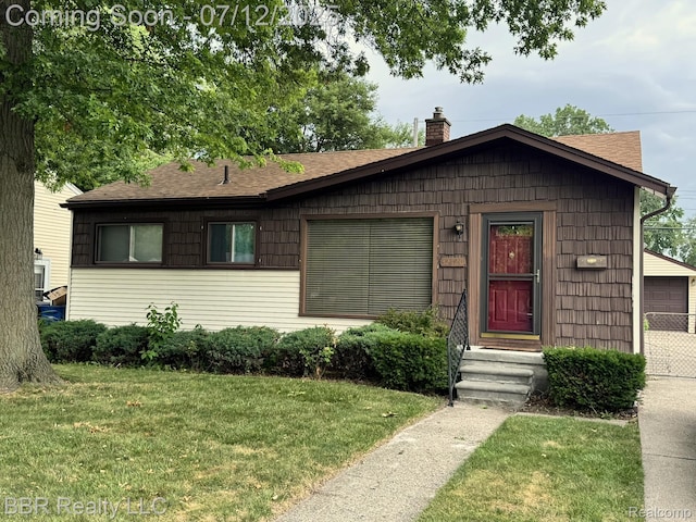 32120 Glen St, Westland, MI 48186 - view of front facade featuring a chimney, a front lawn, roof with shingles, and a garage