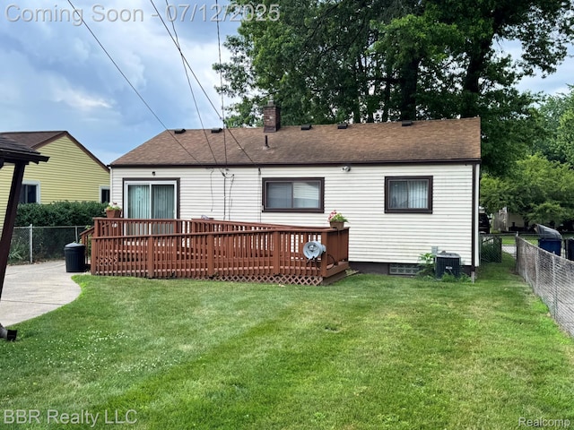 32120 Glen St, Westland, MI 48186 - back of house featuring a fenced backyard, a deck, a chimney, and roof with shingles