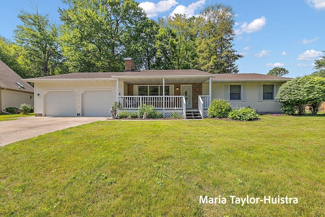 16205 Suffolk Dr, Spring Lake, MI 49456 - single story home featuring covered porch, an attached garage, concrete driveway, a chimney, and a front lawn