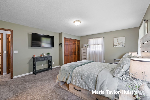 16205 Suffolk Dr, Spring Lake, MI 49456 - carpeted bedroom featuring a closet and baseboards