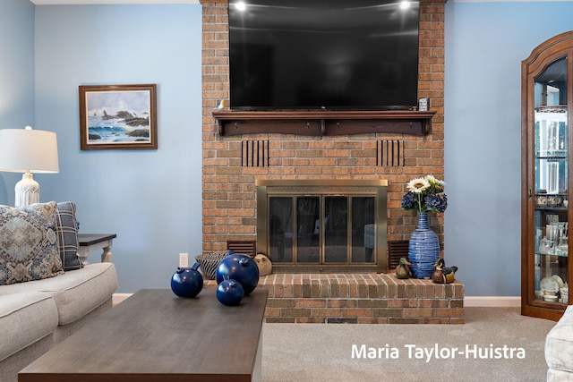 16205 Suffolk Dr, Spring Lake, MI 49456 - carpeted living area featuring a brick fireplace and baseboards