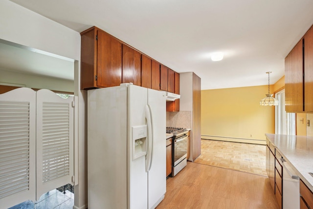 2373 Belgrade Notch St, Ann Arbor, MI 48103 - kitchen with white refrigerator with ice dispenser, stainless steel range with gas stovetop, baseboard heating, light countertops, and pendant lighting