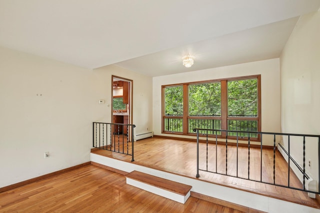 2373 Belgrade Notch St, Ann Arbor, MI 48103 - unfurnished room featuring wood finished floors and baseboard heating