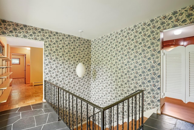 2373 Belgrade Notch St, Ann Arbor, MI 48103 - staircase featuring wallpapered walls and a baseboard radiator