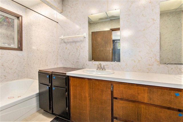 258 Division St, Eastlake, MI 49626 - bathroom with a tub and vanity