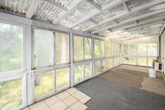 258 Division St, Eastlake, MI 49626 - unfurnished sunroom featuring vaulted ceiling and plenty of natural light