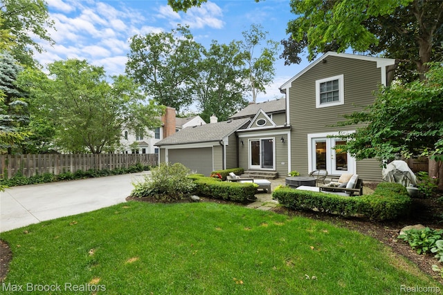 639 N Glenhurst Dr, Birmingham, MI 48009 - traditional home featuring a garage, driveway, an outdoor hangout area, entry steps, and roof with shingles