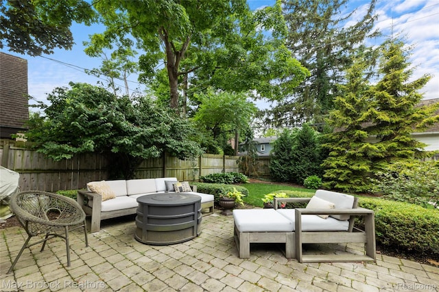 639 N Glenhurst Dr, Birmingham, MI 48009 - fenced backyard with outdoor lounge area and a patio