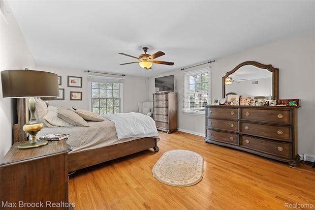 639 N Glenhurst Dr, Birmingham, MI 48009 - bedroom featuring multiple windows, light wood finished floors, and ceiling fan