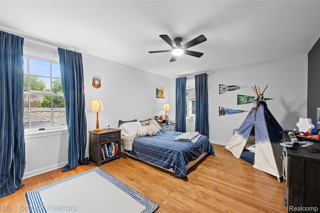 639 N Glenhurst Dr, Birmingham, MI 48009 - bedroom with light wood-type flooring and ceiling fan