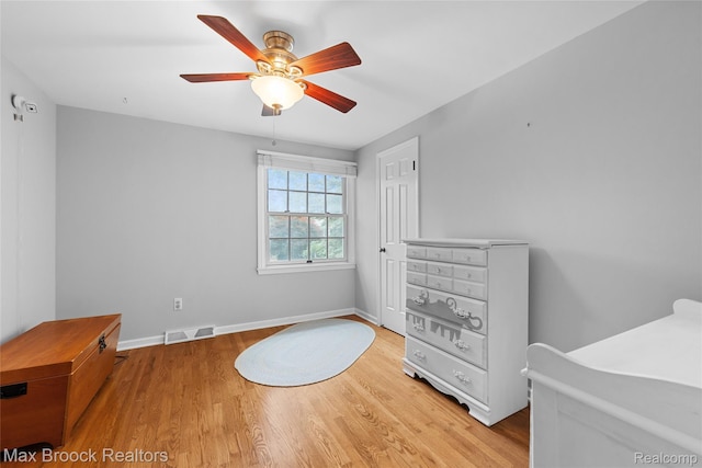 639 N Glenhurst Dr, Birmingham, MI 48009 - unfurnished bedroom featuring wood finished floors and a ceiling fan