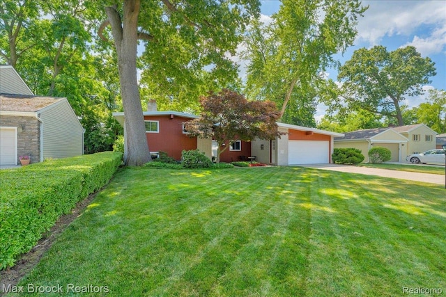 2419 Avondale St W, Sylvan Lake, MI 48320 - view of front of house featuring concrete driveway, a garage, and a front yard