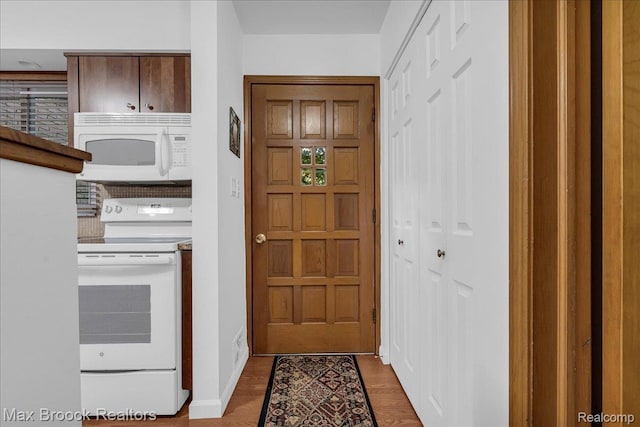 2419 Avondale St W, Sylvan Lake, MI 48320 - entryway with baseboards and wood finished floors