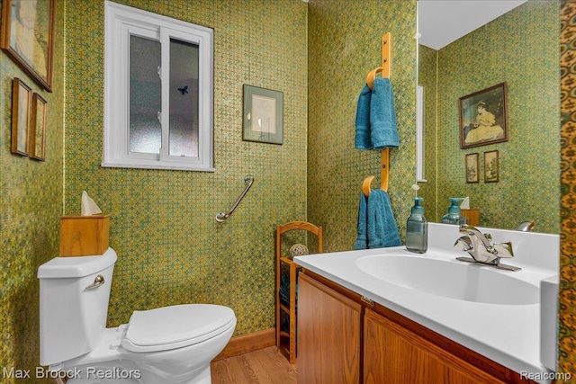 2419 Avondale St W, Sylvan Lake, MI 48320 - bathroom featuring vanity and wood finished floors