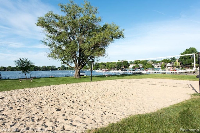 2419 Avondale St W, Sylvan Lake, MI 48320 - surrounding community featuring volleyball court, a water view, and a lawn