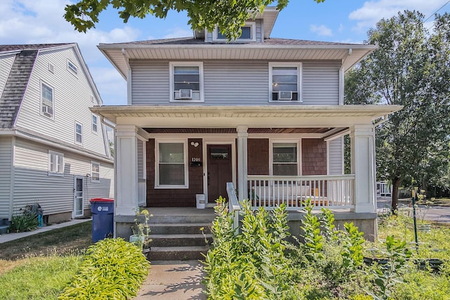 1200 Sherman St SE, Grand Rapids, MI 49506 - american foursquare style home with covered porch