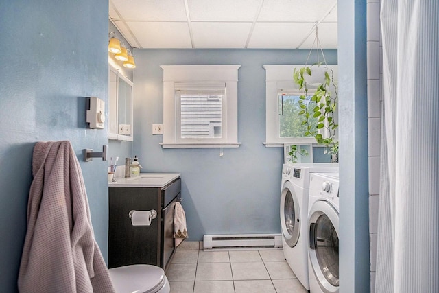 1200 Sherman St SE, Grand Rapids, MI 49506 - full bathroom featuring a baseboard radiator, independent washer and dryer, tile patterned floors, a drop ceiling, and vanity