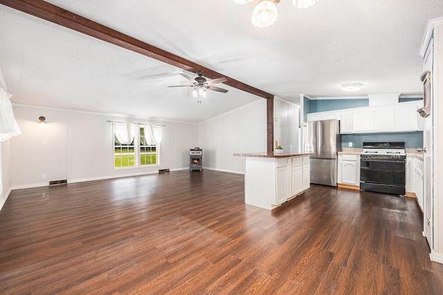2141 S Parsons Ave, Fremont, MI 49412 - kitchen featuring gas range, freestanding refrigerator, open floor plan, and dark wood-type flooring