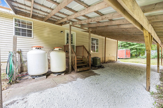 2141 S Parsons Ave, Fremont, MI 49412 - view of patio / terrace featuring a carport