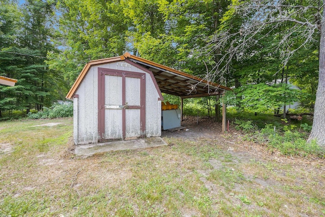 2141 S Parsons Ave, Fremont, MI 49412 - view of shed with a carport