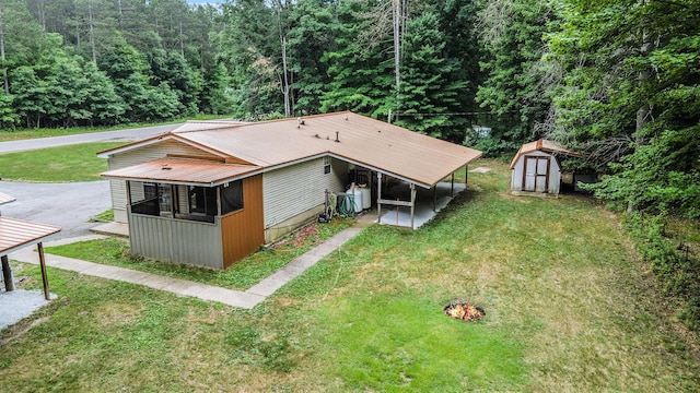 2141 S Parsons Ave, Fremont, MI 49412 - aerial view of property and surrounding area featuring a heavily wooded area