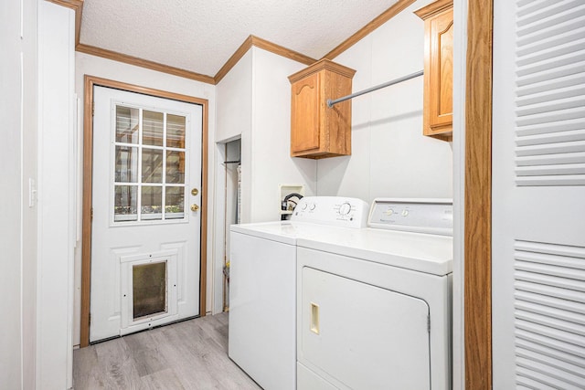 2141 S Parsons Ave, Fremont, MI 49412 - laundry room featuring cabinet space, washer and clothes dryer, light wood finished floors, ornamental molding, and a textured ceiling