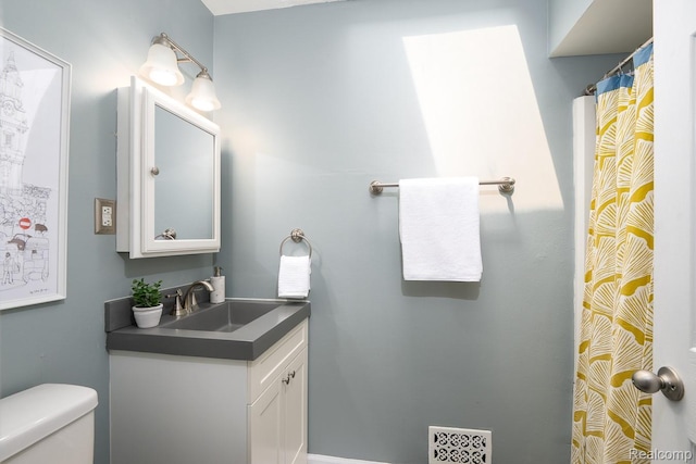 3410 N Main St, Royal Oak, MI 48073 - bathroom with toilet and vanity