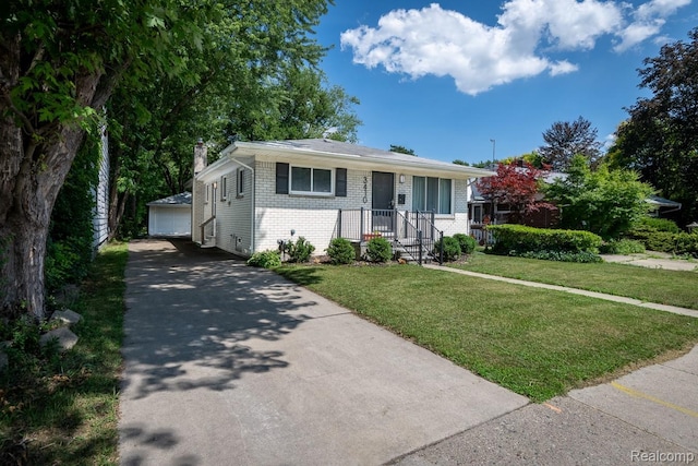 3410 N Main St, Royal Oak, MI 48073 - view of front of house featuring brick siding, a front yard, an outdoor structure, a chimney, and a garage