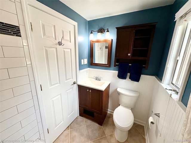 1983 Graefield Rd, Birmingham, MI 48009 - bathroom with vanity, wainscoting, and tile patterned flooring