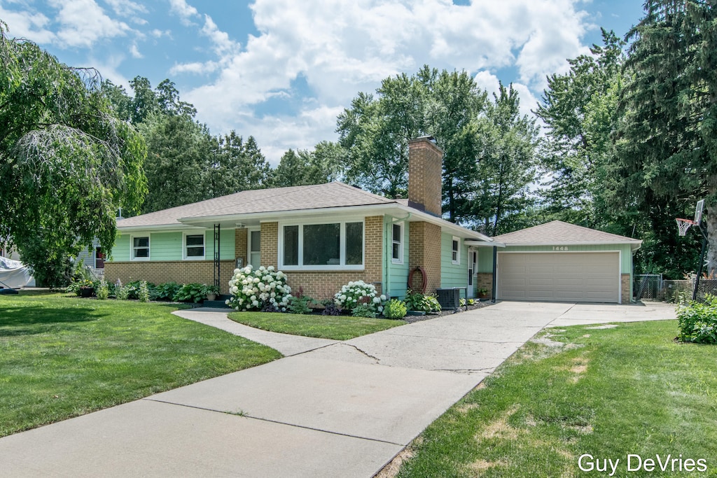 1448 Meadowlane Dr SE, Kentwood, MI 49508 - photo 1