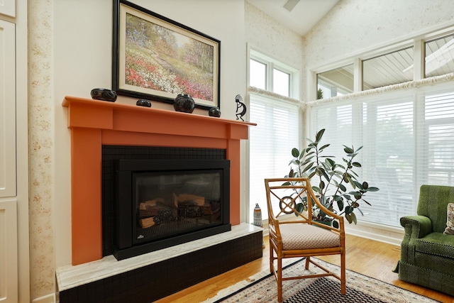 5 Mission Rdg, Frankenmuth, MI 48734 - living area with a glass covered fireplace and wood finished floors