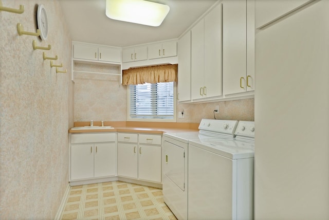 5 Mission Rdg, Frankenmuth, MI 48734 - laundry room with separate washer and dryer, cabinet space, and light flooring