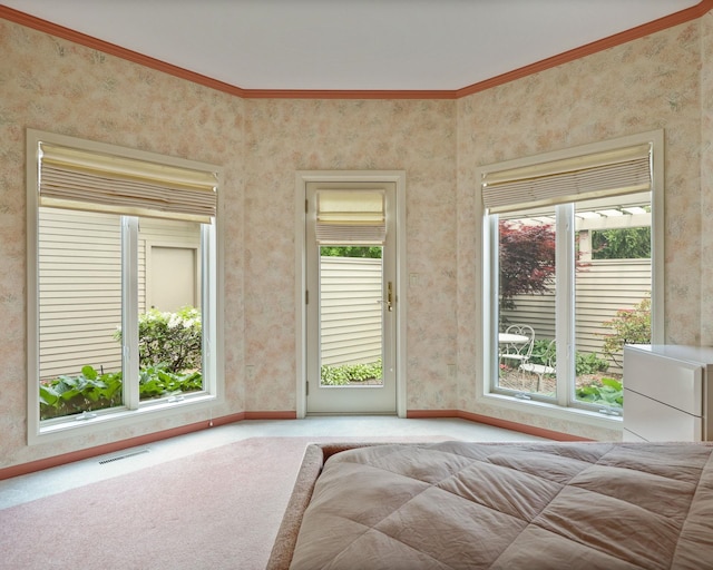 5 Mission Rdg, Frankenmuth, MI 48734 - carpeted bedroom featuring crown molding, wallpapered walls, and access to outside