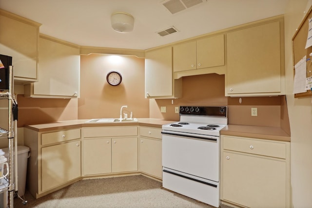 5 Mission Rdg, Frankenmuth, MI 48734 - kitchen featuring white electric range oven, cream cabinets, and light countertops