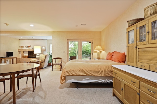 5 Mission Rdg, Frankenmuth, MI 48734 - bedroom featuring access to exterior, light carpet, and french doors
