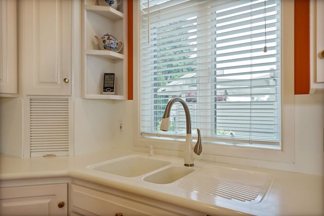 5 Mission Rdg, Frankenmuth, MI 48734 - kitchen with plenty of natural light, white cabinetry, light countertops, and open shelves