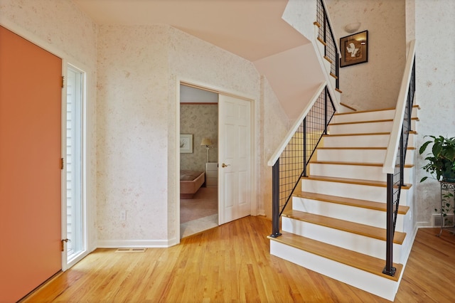5 Mission Rdg, Frankenmuth, MI 48734 - stairs with wallpapered walls and wood finished floors