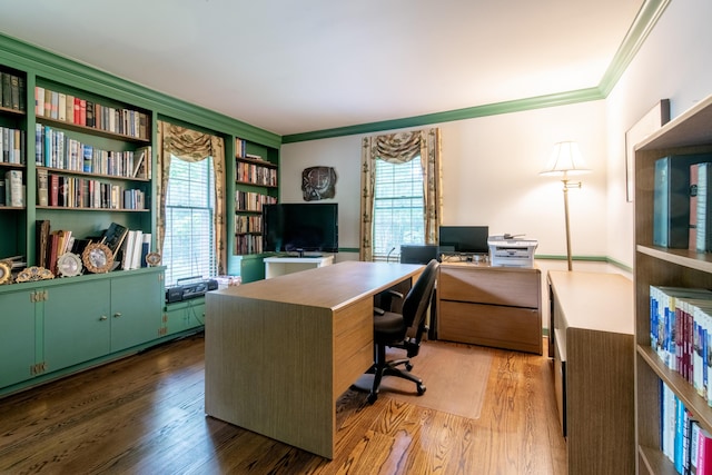 144 Barton N Dr, Ann Arbor, MI 48105 - office area featuring ornamental molding, wood finished floors, and healthy amount of natural light