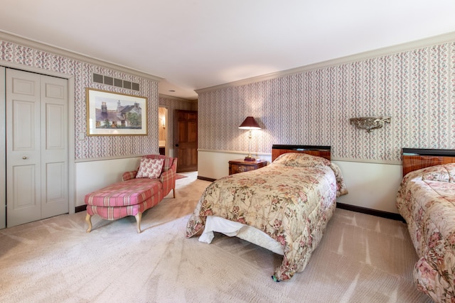144 Barton N Dr, Ann Arbor, MI 48105 - bedroom with wallpapered walls, carpet, a closet, a wainscoted wall, and crown molding