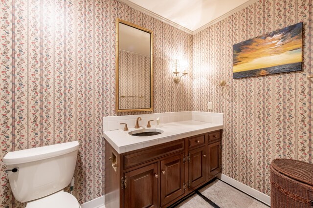 144 Barton N Dr, Ann Arbor, MI 48105 - half bathroom featuring wallpapered walls, vanity, and crown molding