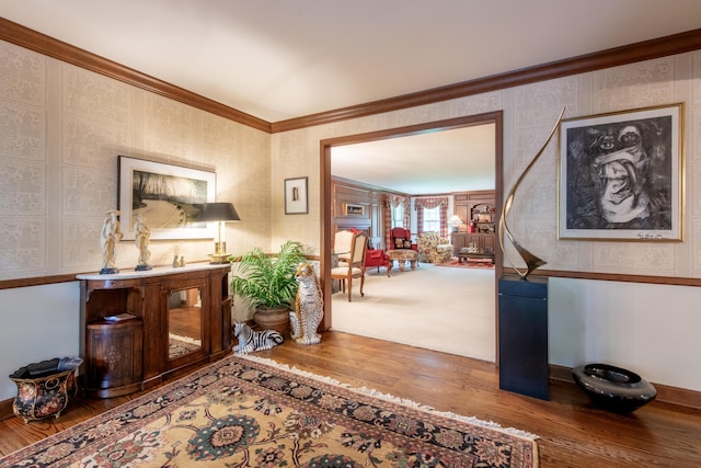 144 Barton N Dr, Ann Arbor, MI 48105 - hall featuring wood finished floors, wallpapered walls, and ornamental molding