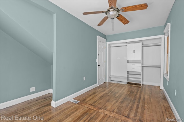 212 La Plaza Ct, Royal Oak, MI 48073 - unfurnished bedroom featuring wood finished floors, a closet, and a ceiling fan