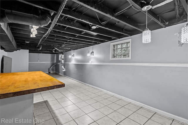 212 La Plaza Ct, Royal Oak, MI 48073 - below grade area with tile patterned floors and baseboards