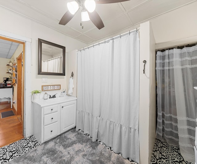 278 E Southern Rd, Coldwater, MI 49036 - bathroom featuring vanity, a ceiling fan, a shower with curtain, and wood finished floors