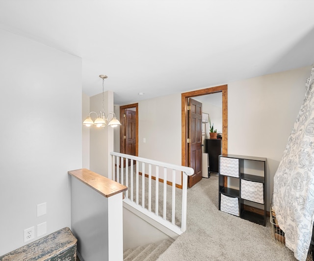278 E Southern Rd, Coldwater, MI 49036 - corridor featuring a chandelier, light carpet, and an upstairs landing