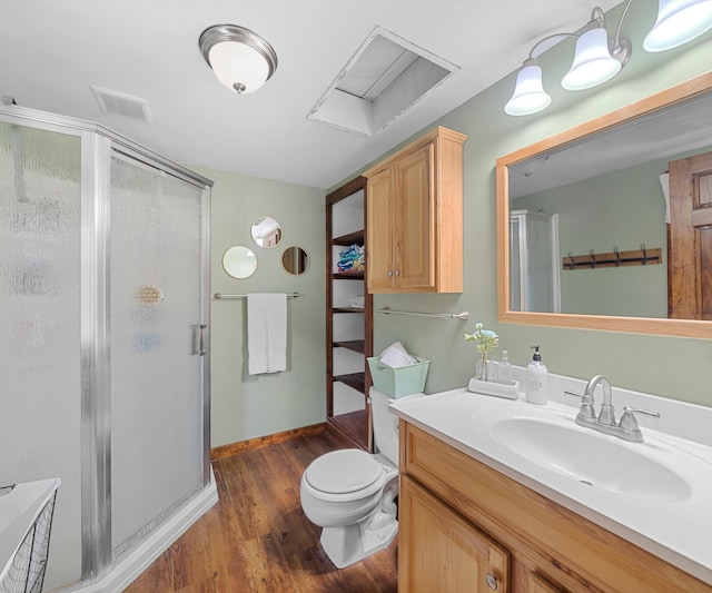 278 E Southern Rd, Coldwater, MI 49036 - bathroom with a shower stall, vanity, and wood finished floors